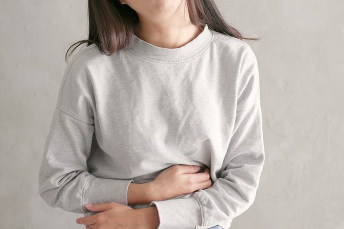  Woman suffer from stomach pain 
